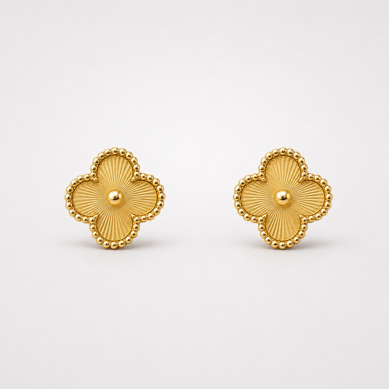 Les boucles d'oreilles trèfle