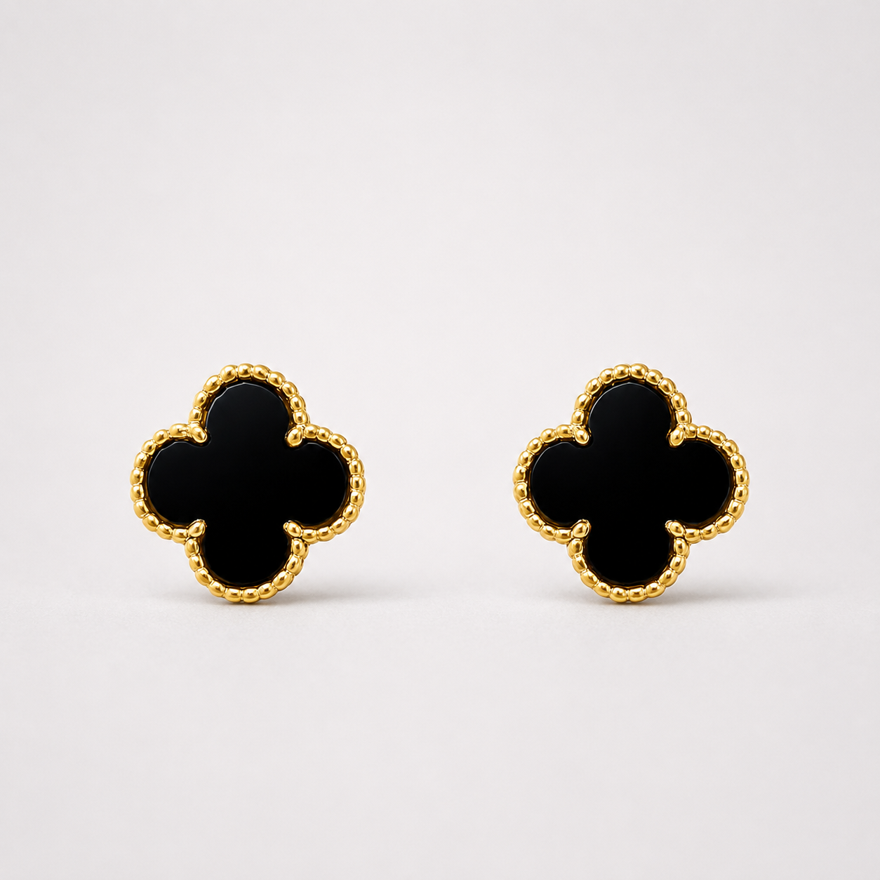 Les boucles d'oreilles trèfle