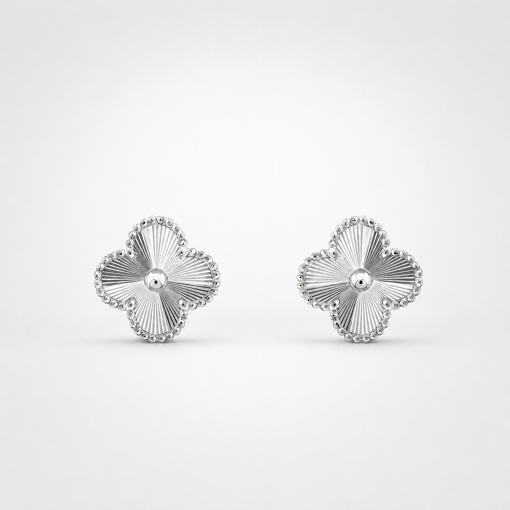 Les boucles d'oreilles trèfle