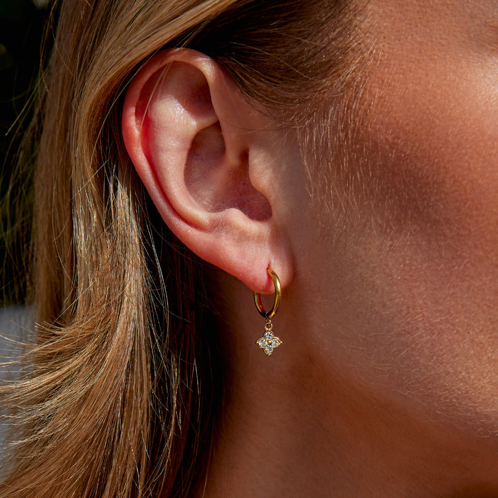 Les boucles d'oreilles trèfle à quatre feuilles