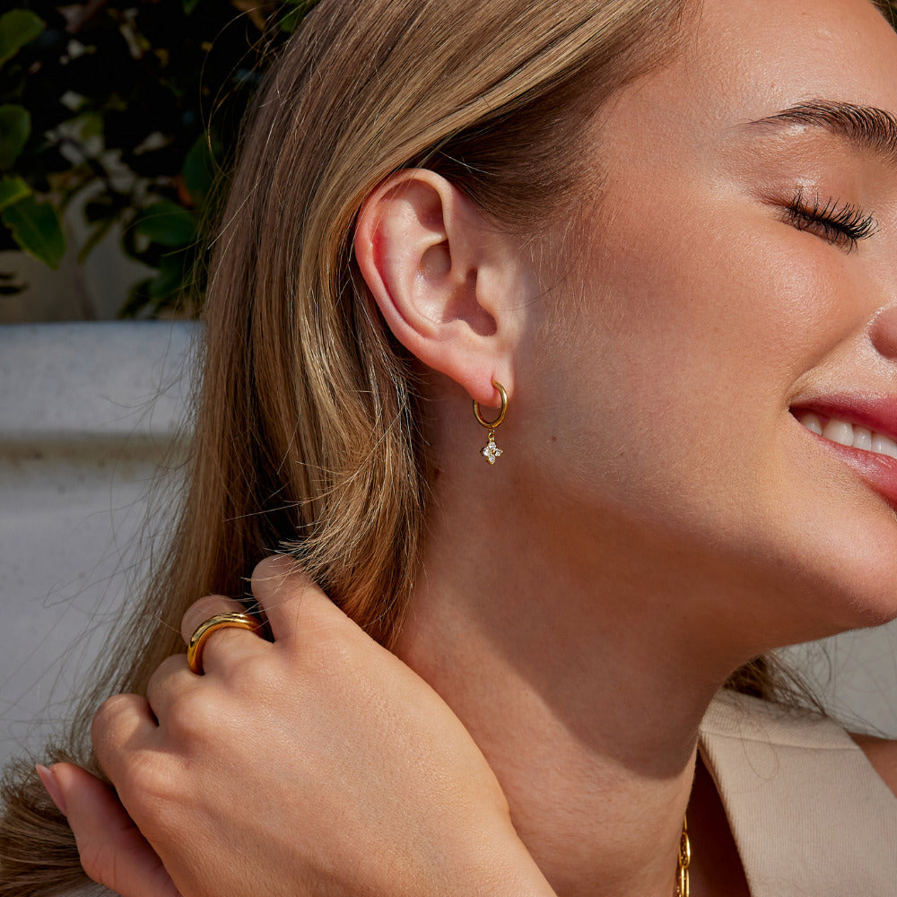 Les boucles d'oreilles trèfle à quatre feuilles