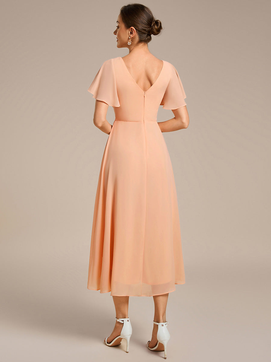 Robe femme d’invitée de mariage chic col V coupe fluide élégante