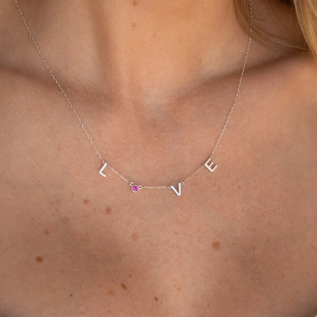 Collier avec initiale, pierre de naissance et signe du zodiaque
