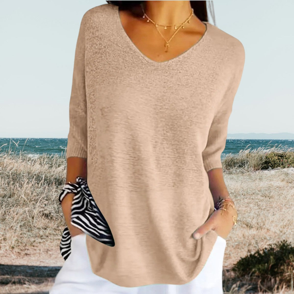 Top avec décolleté en V et manches trois-quarts