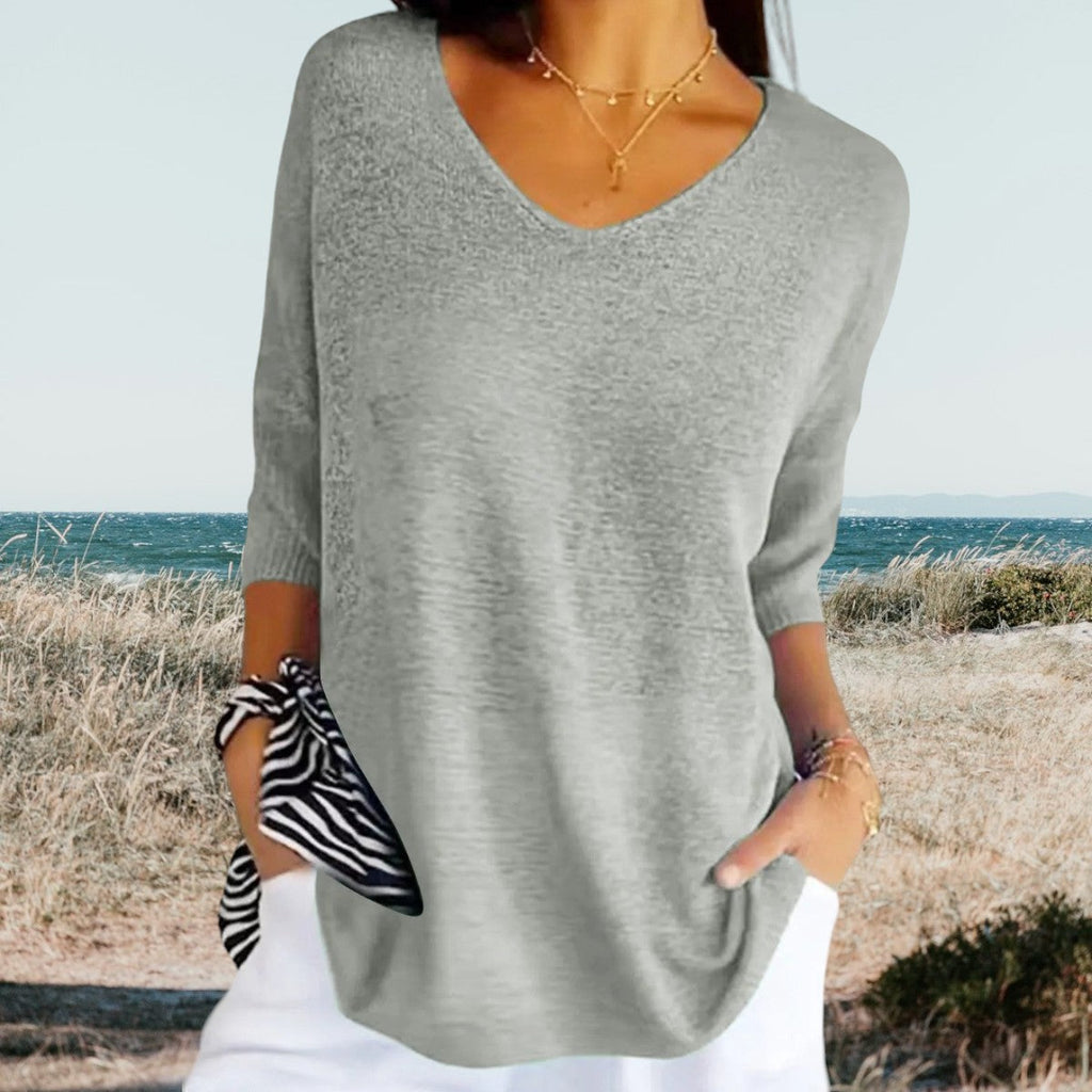 Top avec décolleté en V et manches trois-quarts