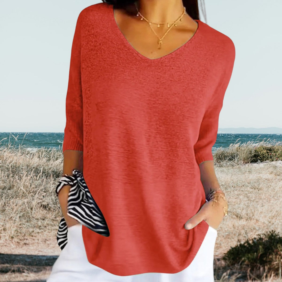 Top avec décolleté en V et manches trois-quarts