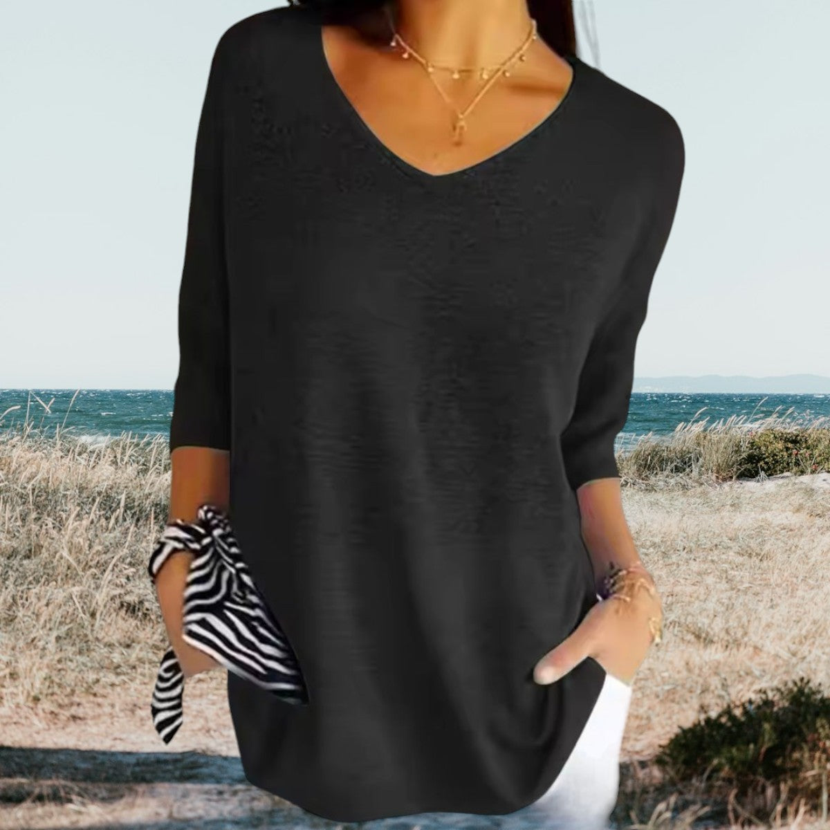 Top avec décolleté en V et manches trois-quarts