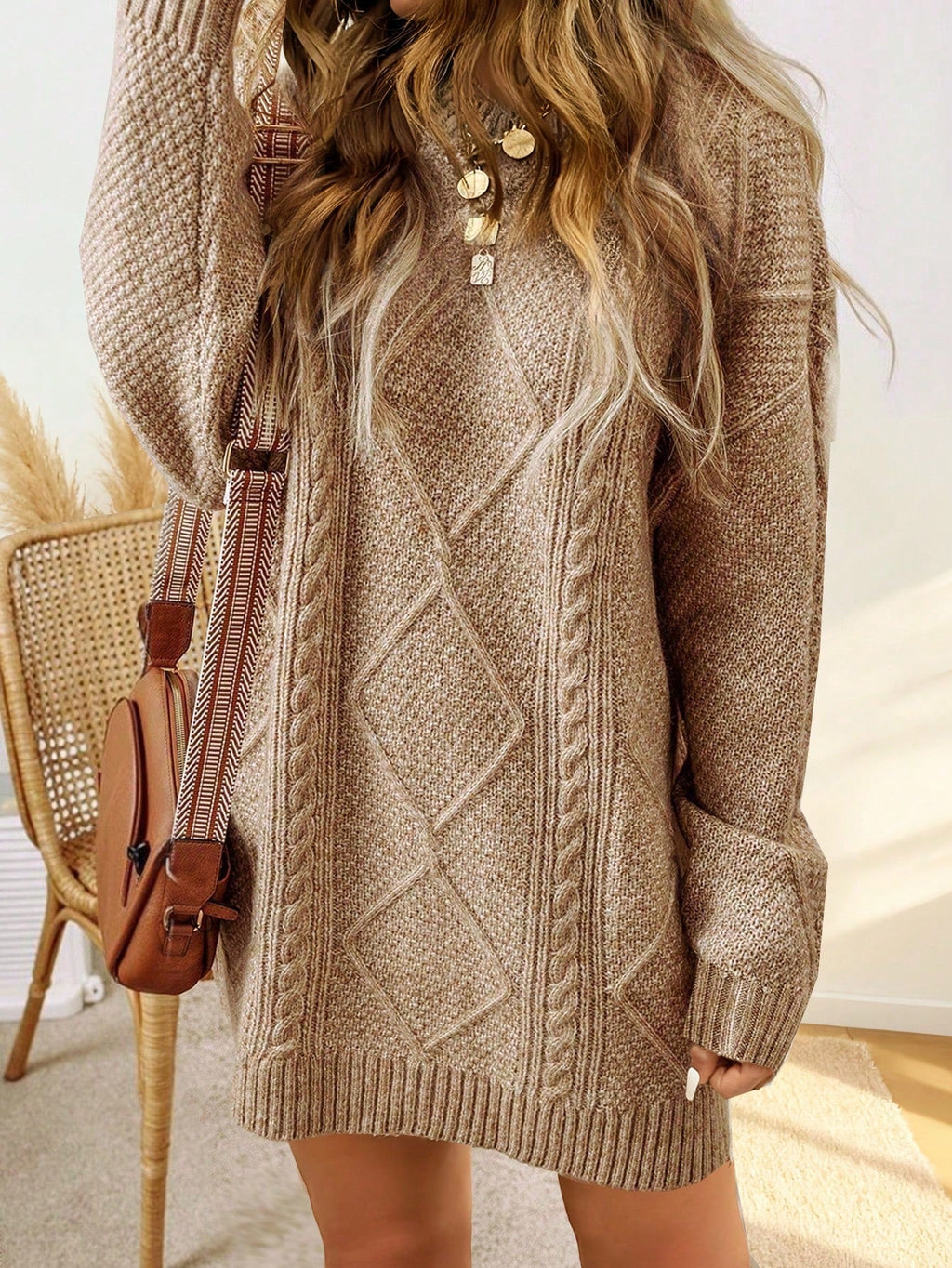 Robe pull avec motif en cable et finitions côtelées