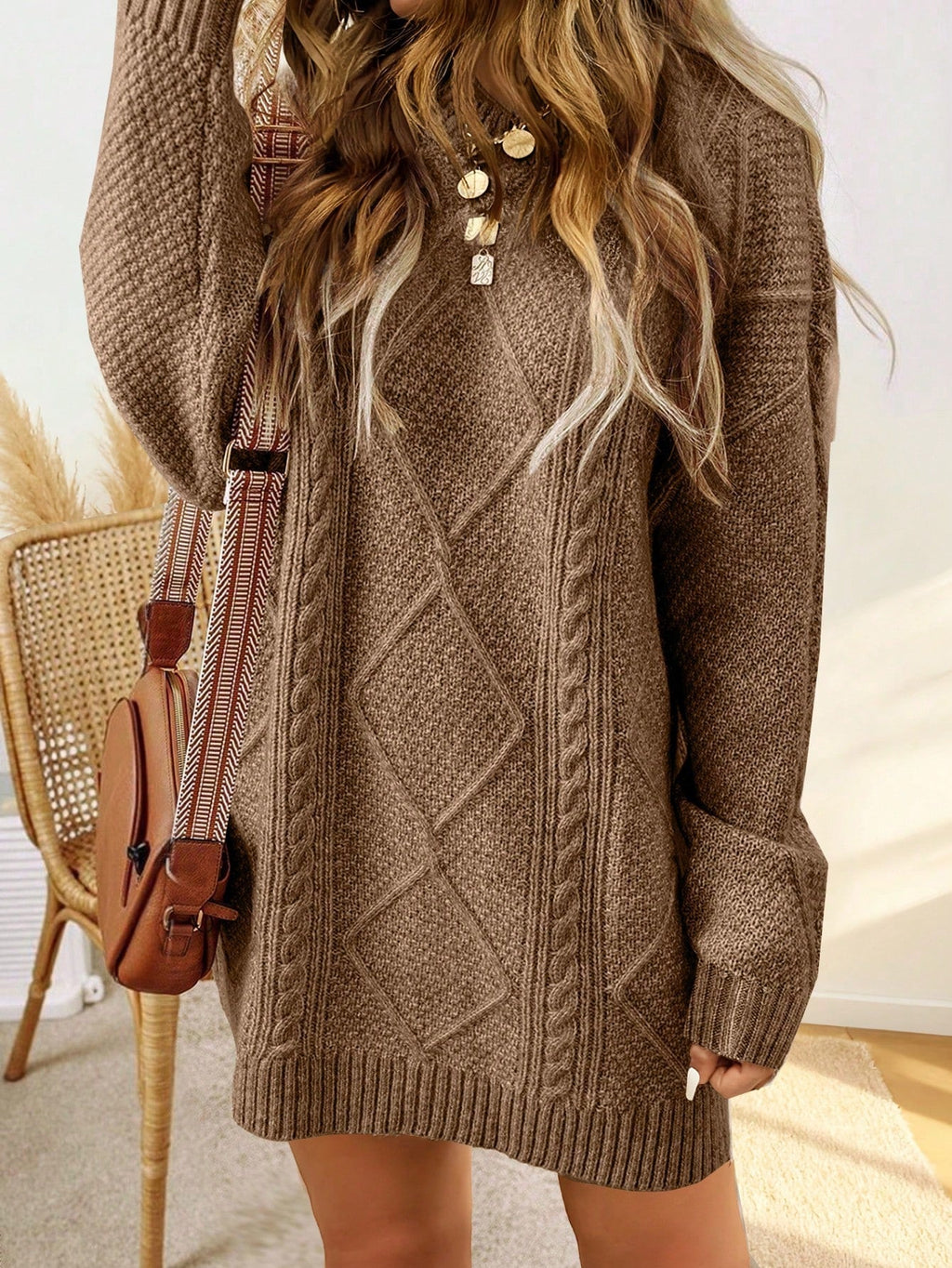 Robe pull avec motif en cable et finitions côtelées