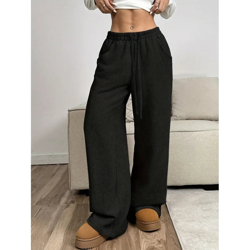 Pantalon en velours côtelé à taille haute avec cordon de serrage et jambes larges