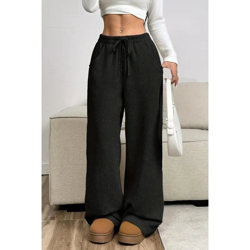 Pantalon en velours côtelé à taille haute avec cordon de serrage et jambes larges