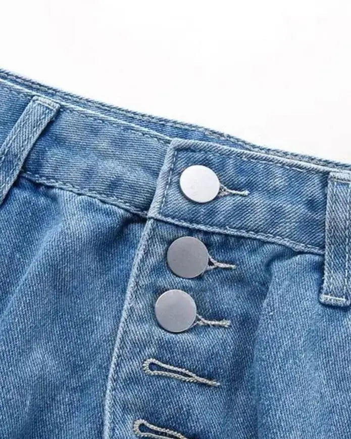 Pantalon femme avec des trous aux genoux et aux cuisses et fermeture à boutons