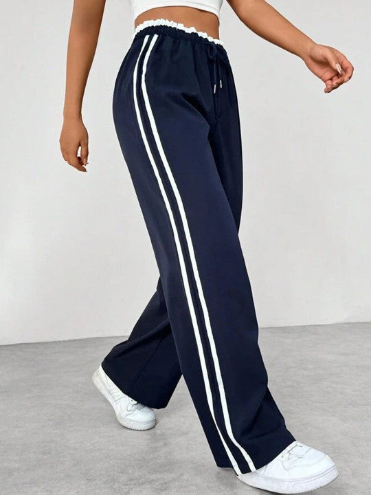 Pantalon femme avec rayures latérales et taille élastique