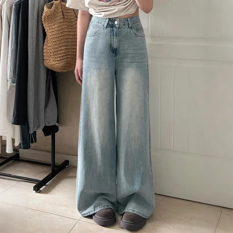 Pantalon femme avec jambes larges, fermeture à bouton, poches avant et passants de ceinture