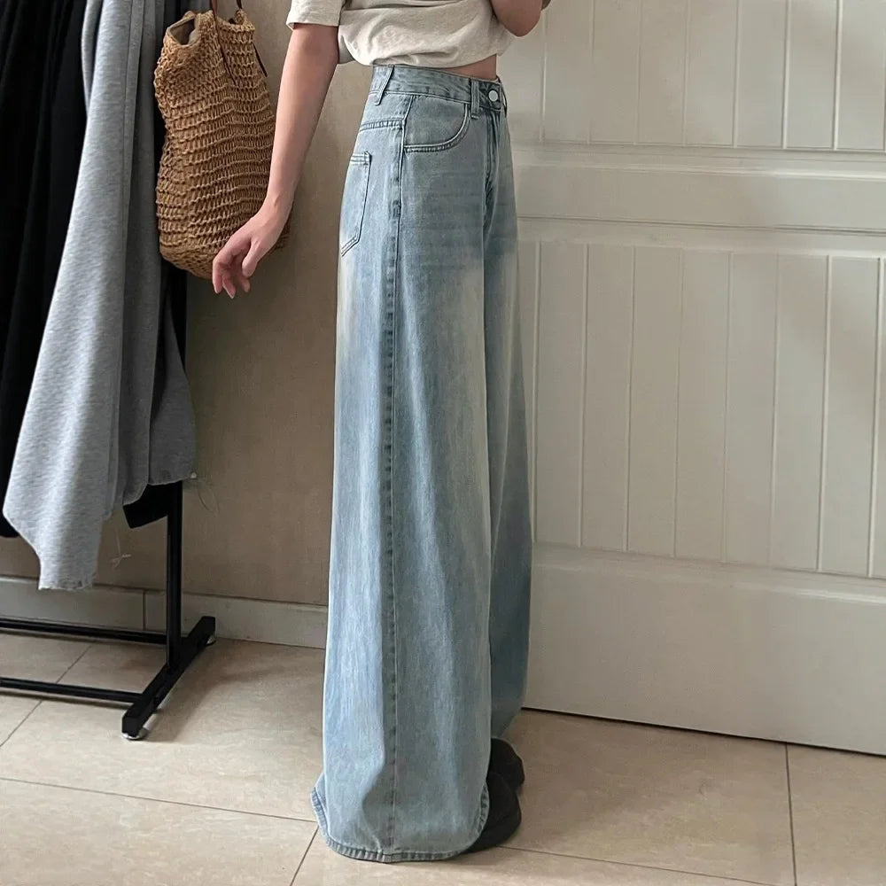 Pantalon femme avec jambes larges, fermeture à bouton, poches avant et passants de ceinture