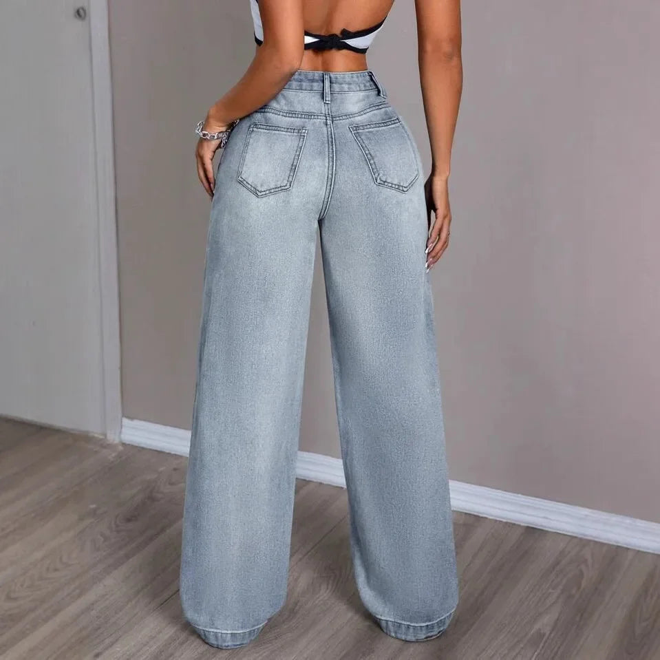 Pantalon pour femmes avec jambes larges, fermeture à bouton et poches passepoilées en lavage léger