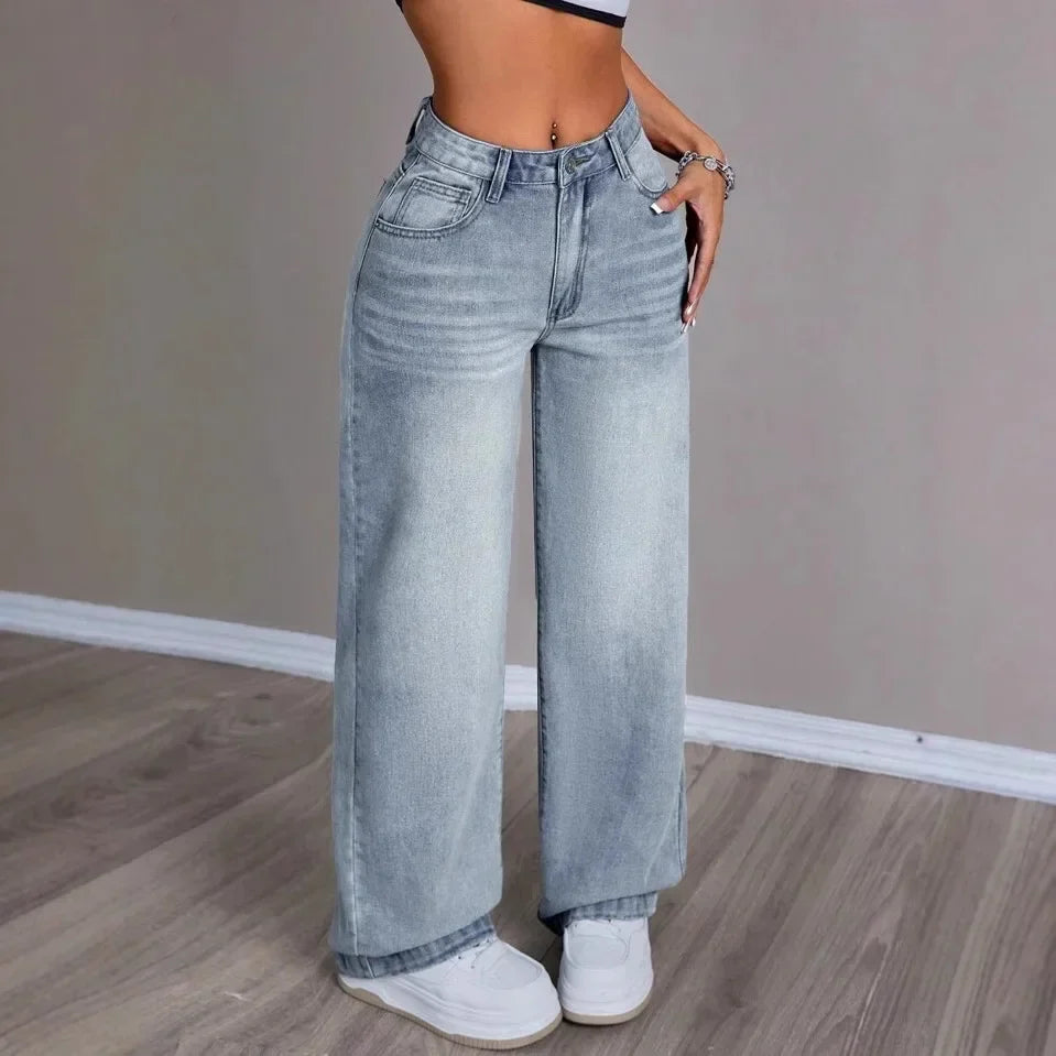 Pantalon pour femmes avec jambes larges, fermeture à bouton et poches passepoilées en lavage léger