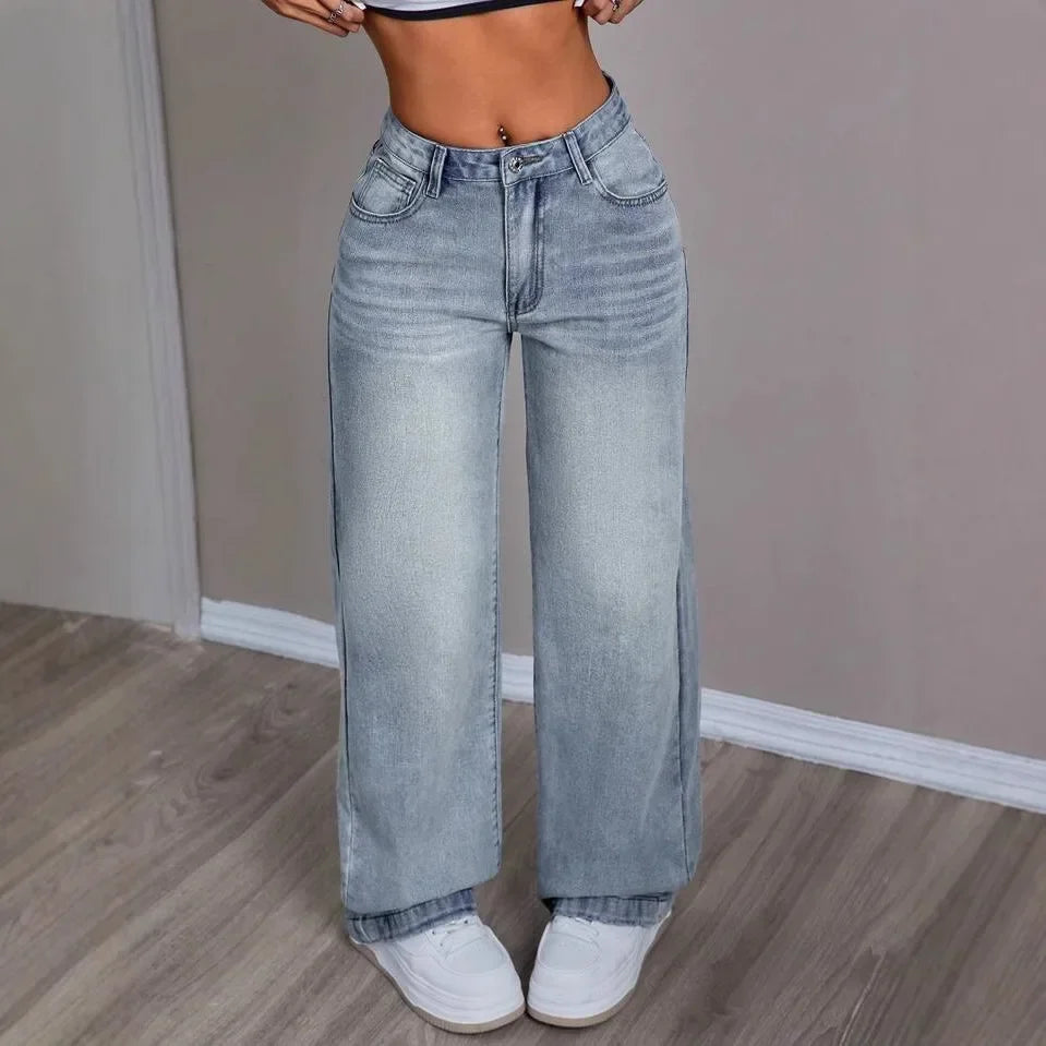 Pantalon pour femmes avec jambes larges, fermeture à bouton et poches passepoilées en lavage léger