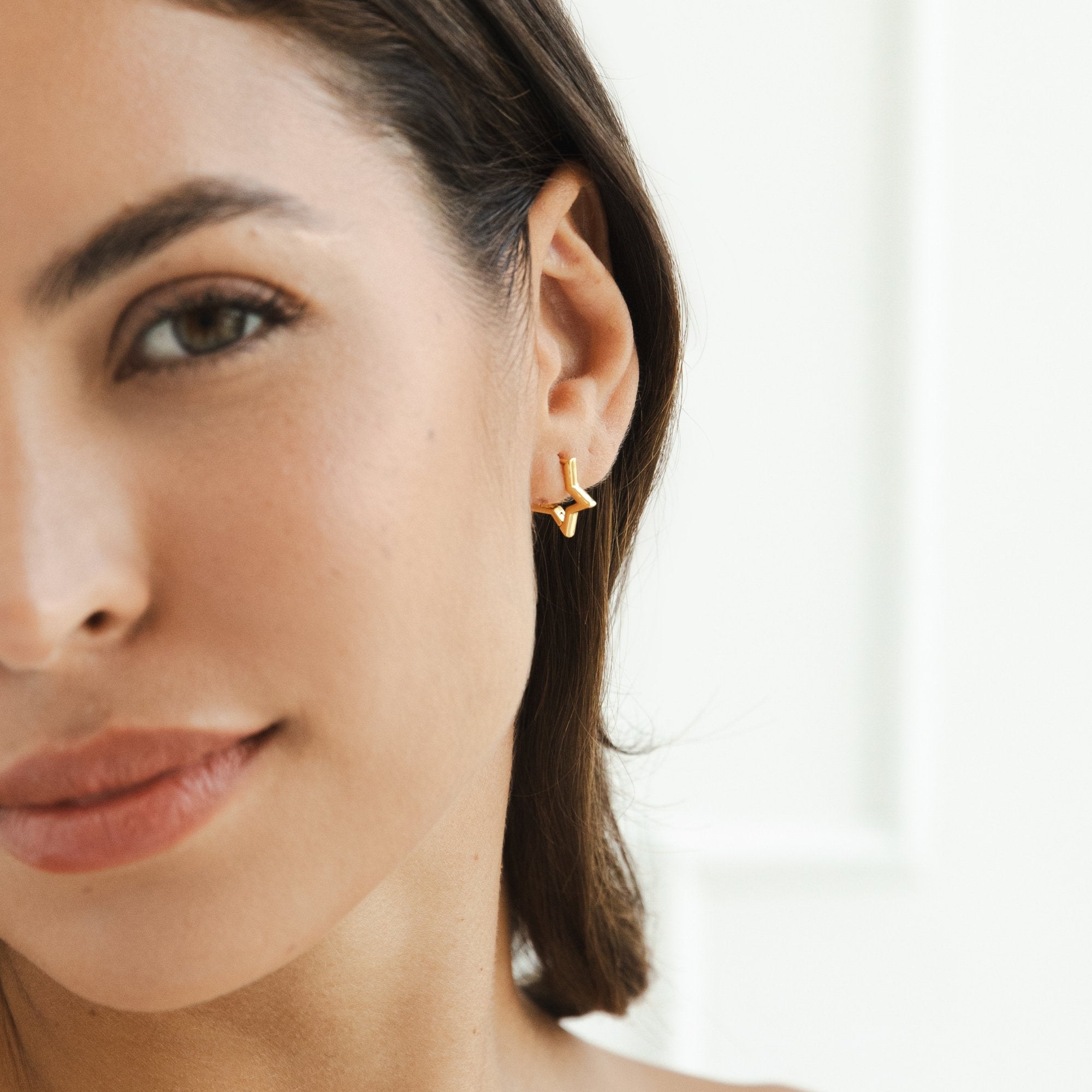 Boucles d'oreilles créoles étoile dorée