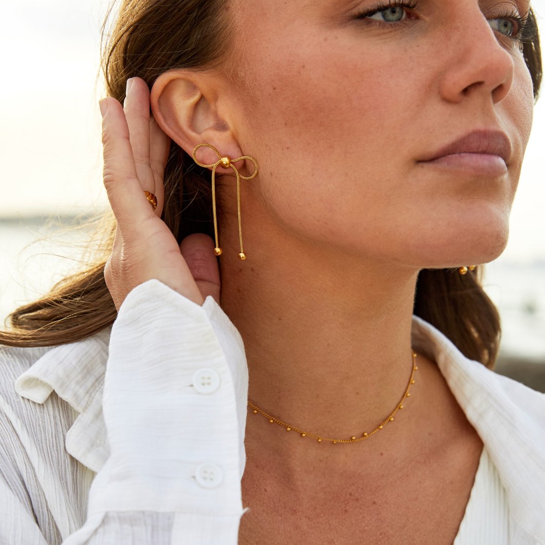 Boucles d'oreilles Lyra à nœud
