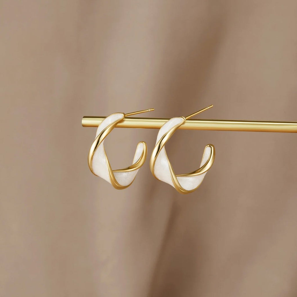 Boucles d'oreilles créoles torsadées en perles