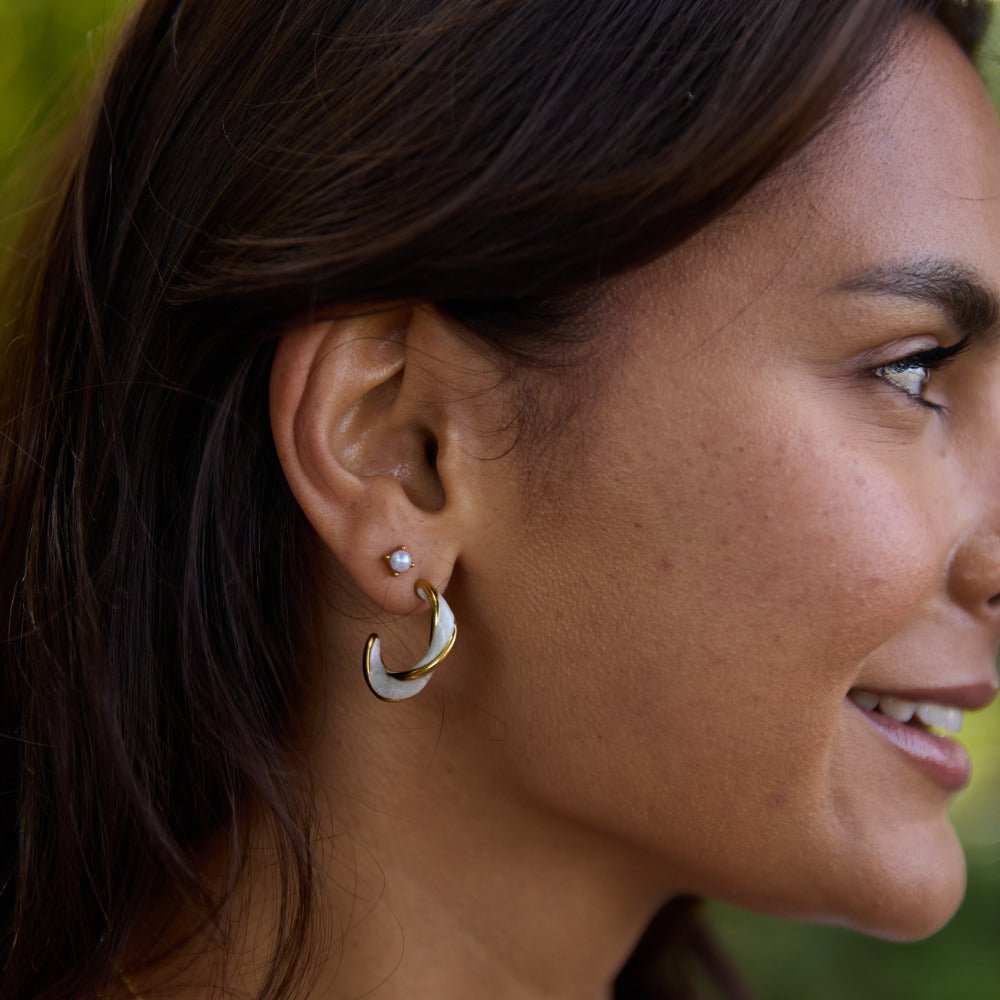 Boucles d'oreilles créoles torsadées en perles