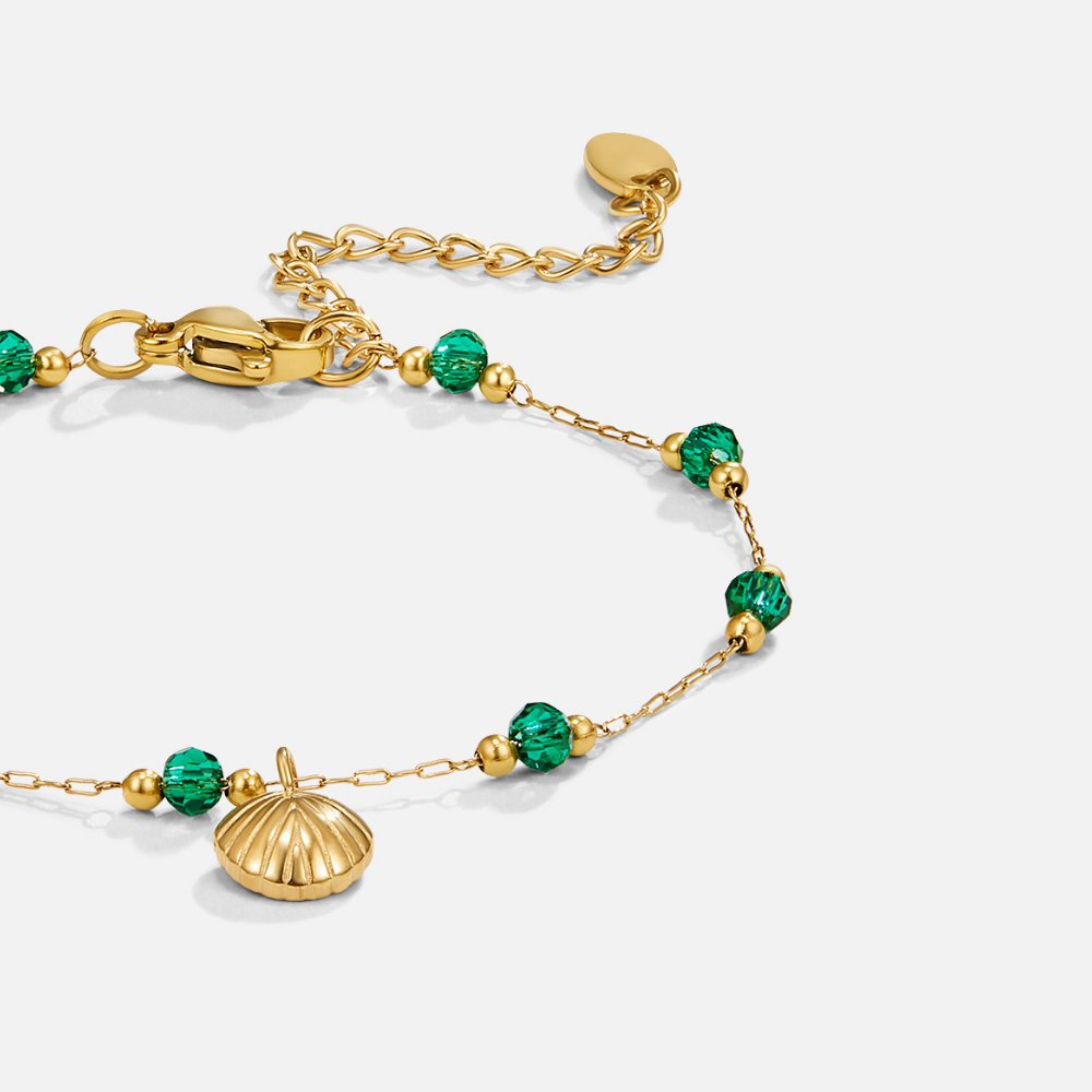 Bracelet coquillage doré et perles vertes