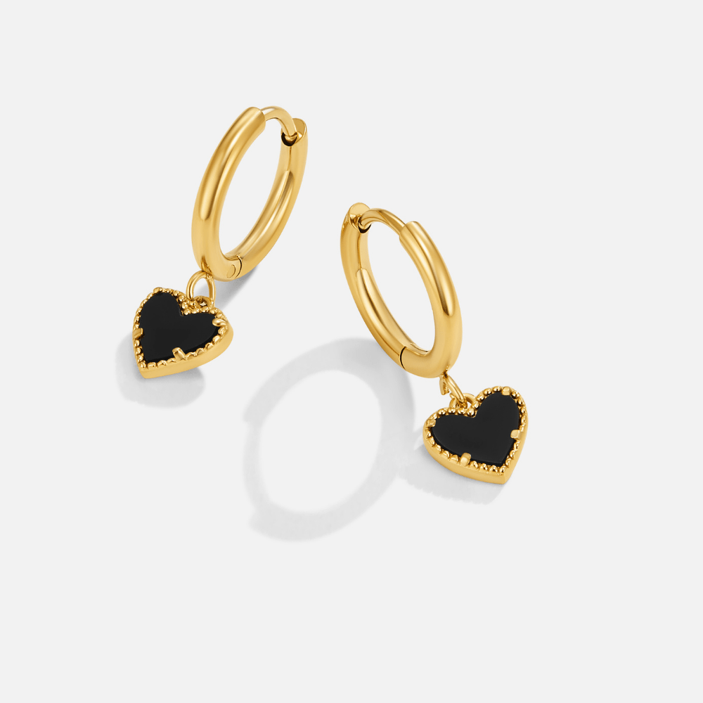 Boucles d'oreilles créoles « Cœurs souillés »