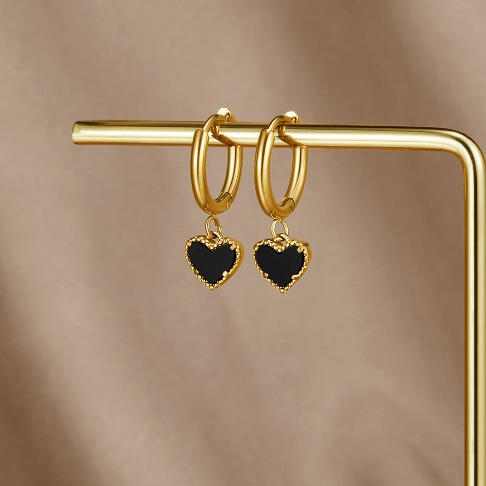 Boucles d'oreilles créoles « Cœurs souillés »