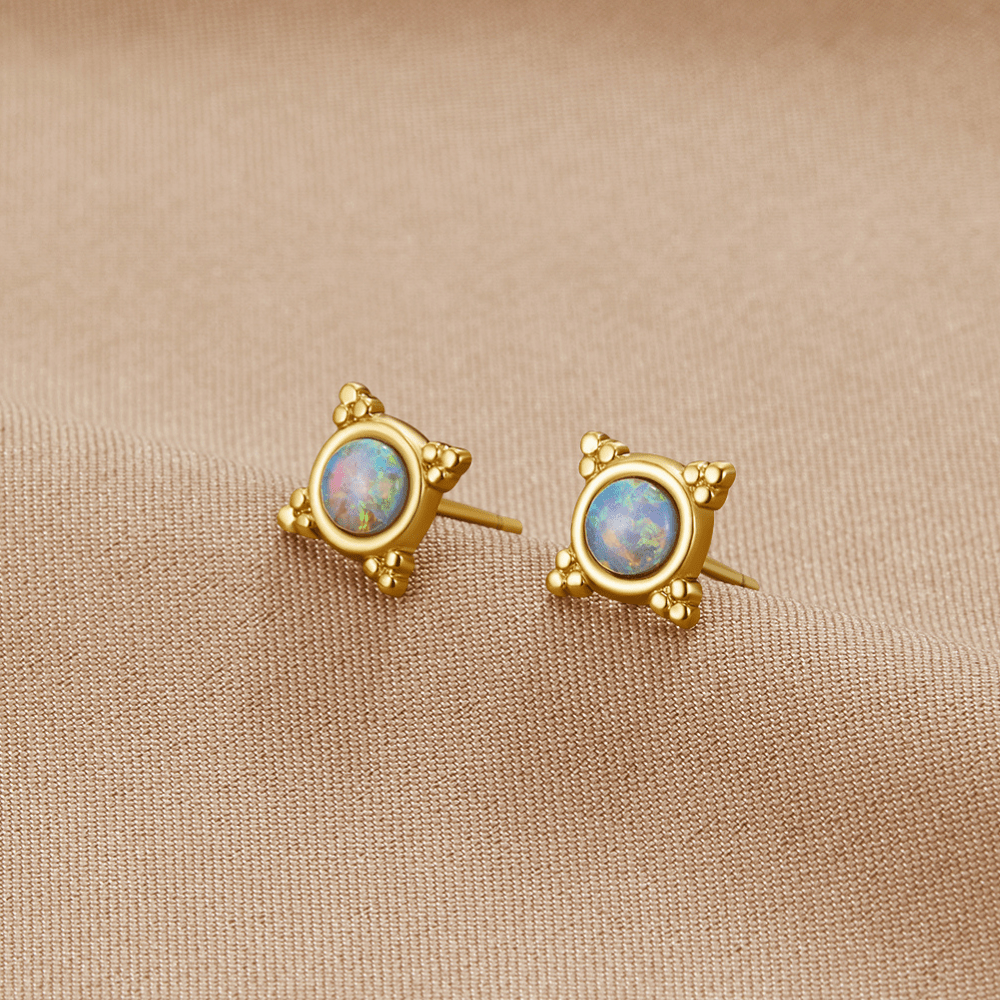 Clous d'oreilles vintage bleus